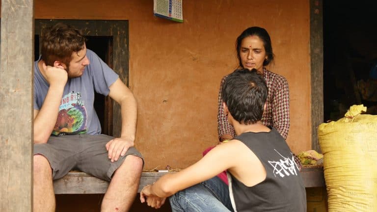 A Bournemouth journalism student talks to an earthquake survivor in Kathmandu
